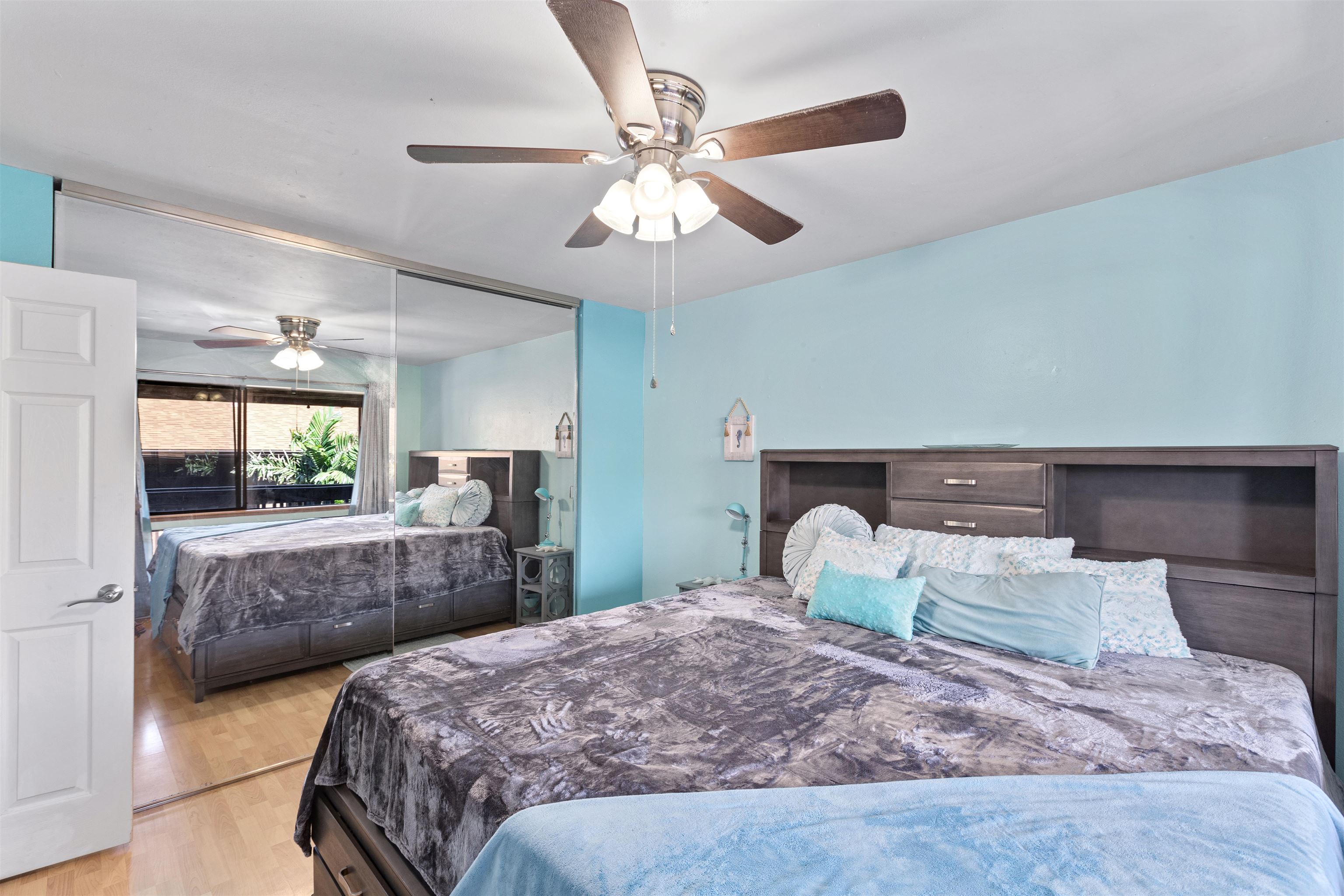 3740 Lower Honoapiilani Road, Unit F306 Lahaina, HI 96761 - Photo 17 of 30 a bedroom with bed and window