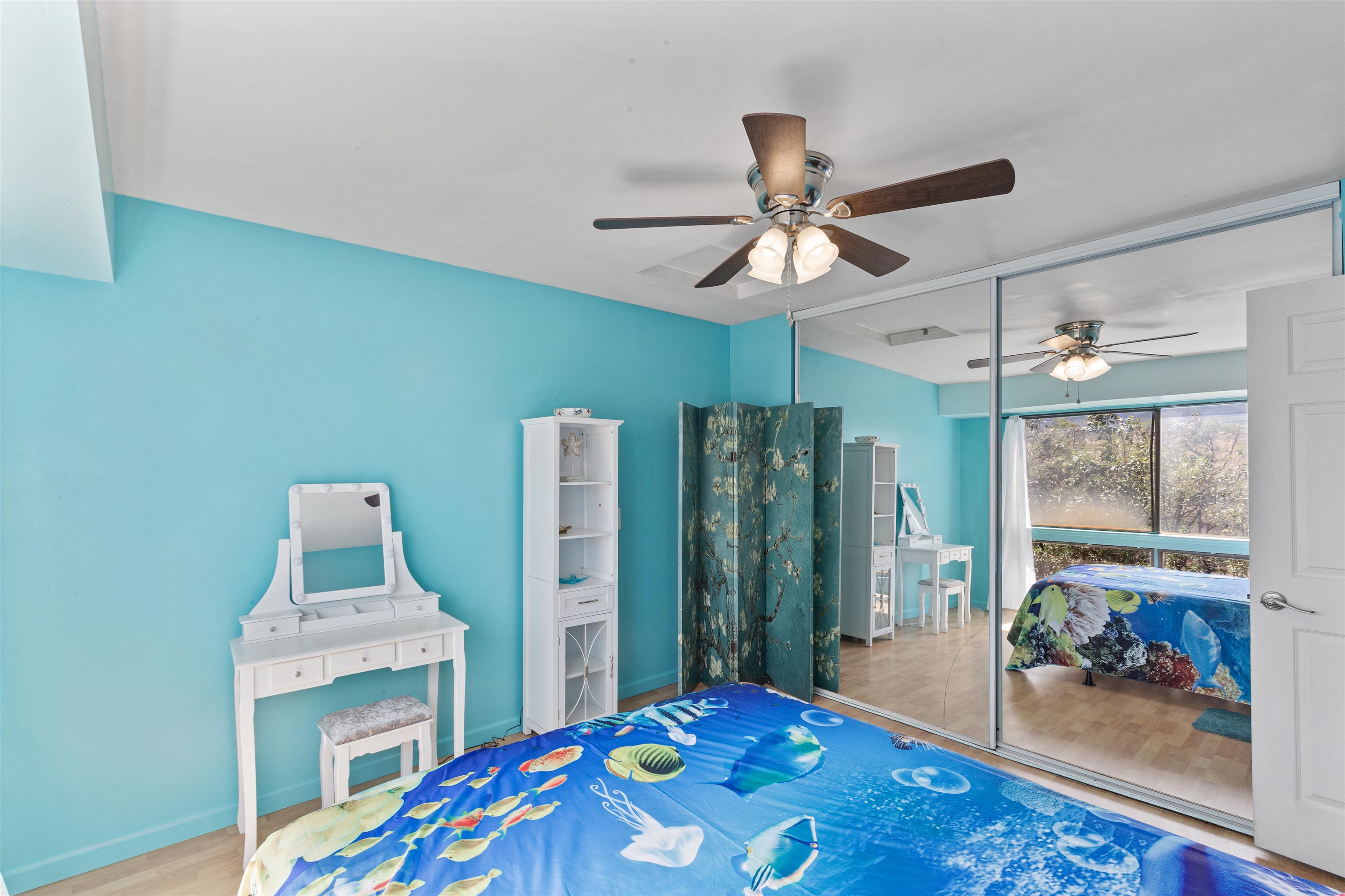 3740 Lower Honoapiilani Road, Unit F306 Lahaina, HI 96761 - Photo 20 of 30 a bedroom with furniture and a window