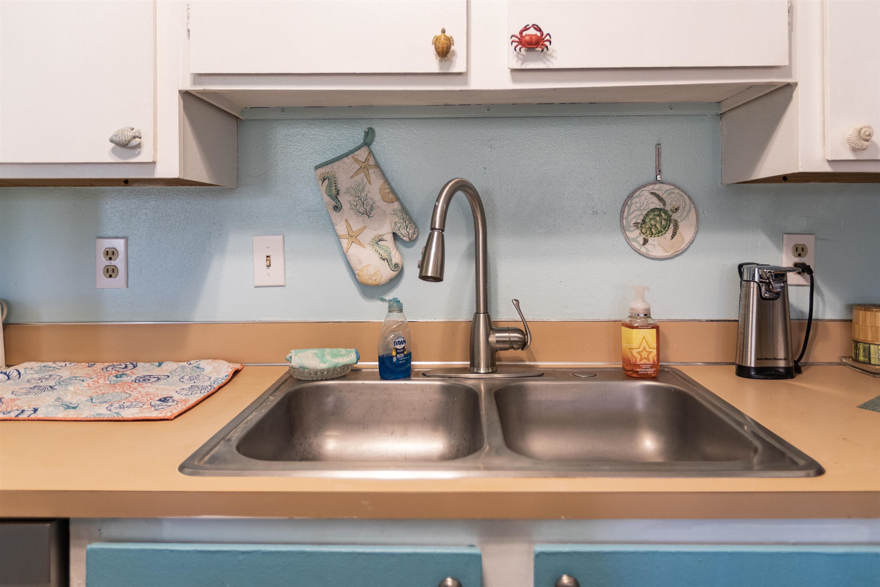 3740 Lower Honoapiilani Road, Unit F306 Lahaina, HI 96761 - Photo 24 of 30 a kitchen sink with a stove top oven