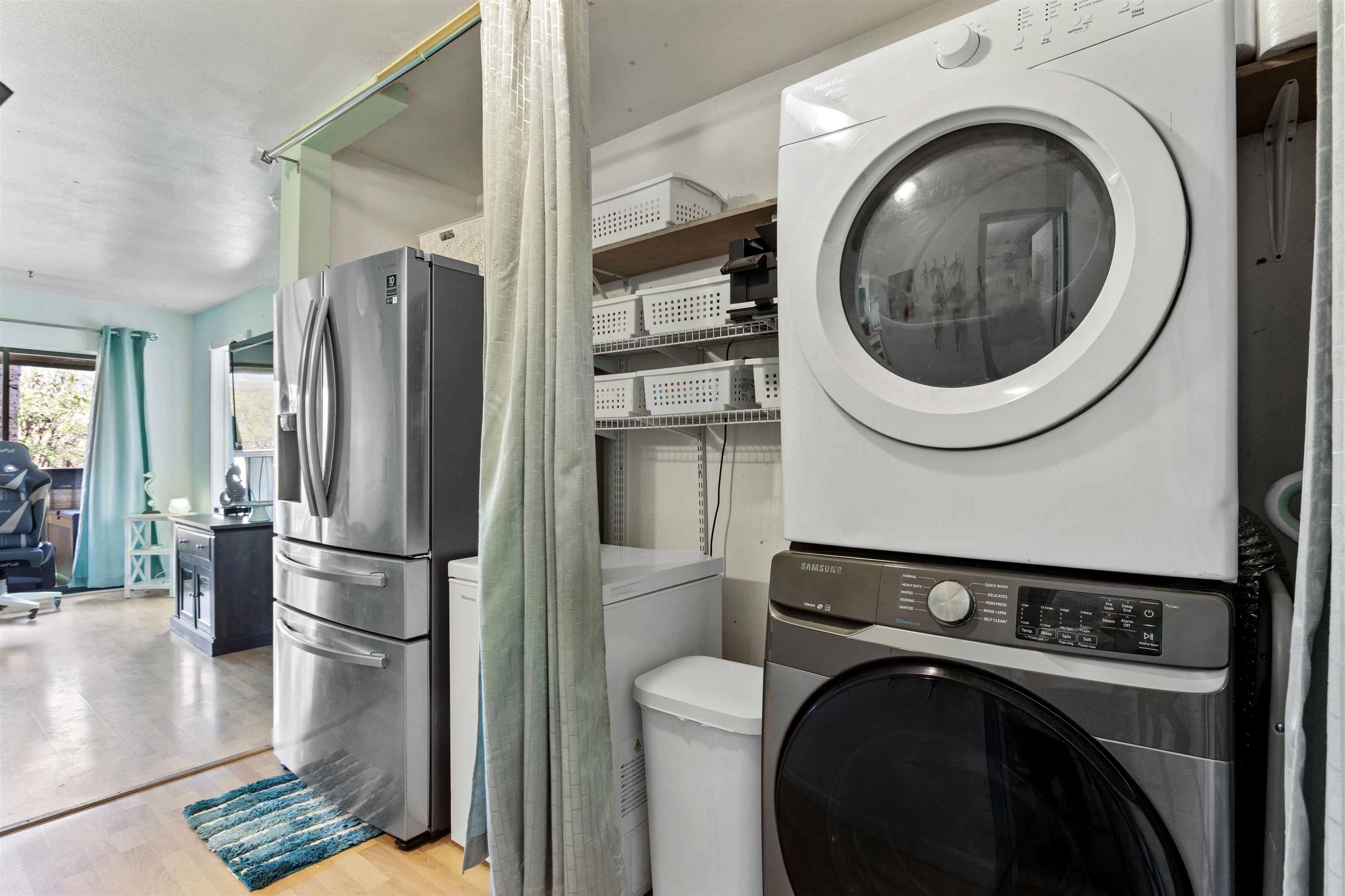 3740 Lower Honoapiilani Road, Unit F306 Lahaina, HI 96761 - Photo 28 of 30 a kitchen with a washer and dryer