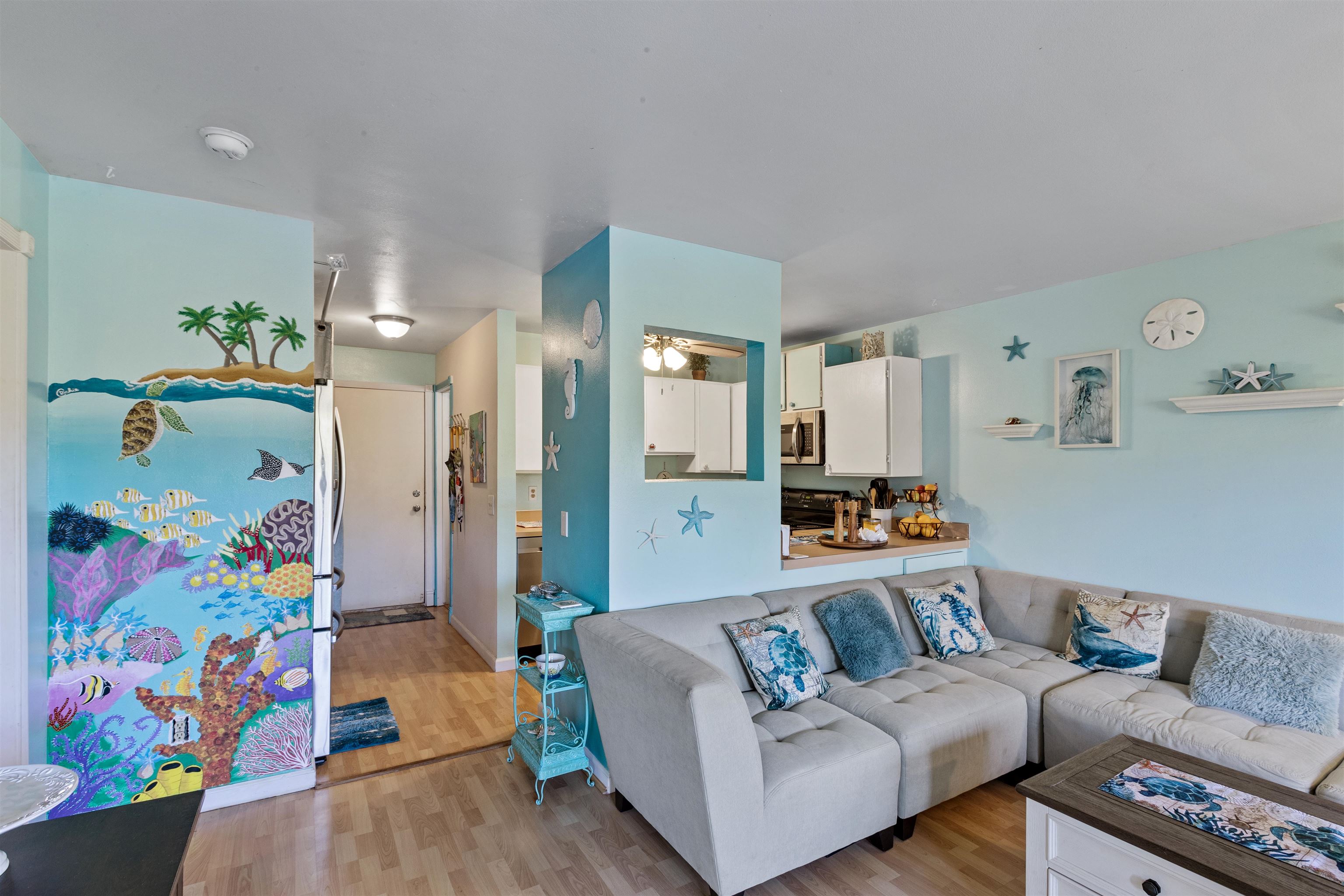 3740 Lower Honoapiilani Road, Unit F306 Lahaina, HI 96761 - Photo 6 of 30 a living room with furniture and a couch