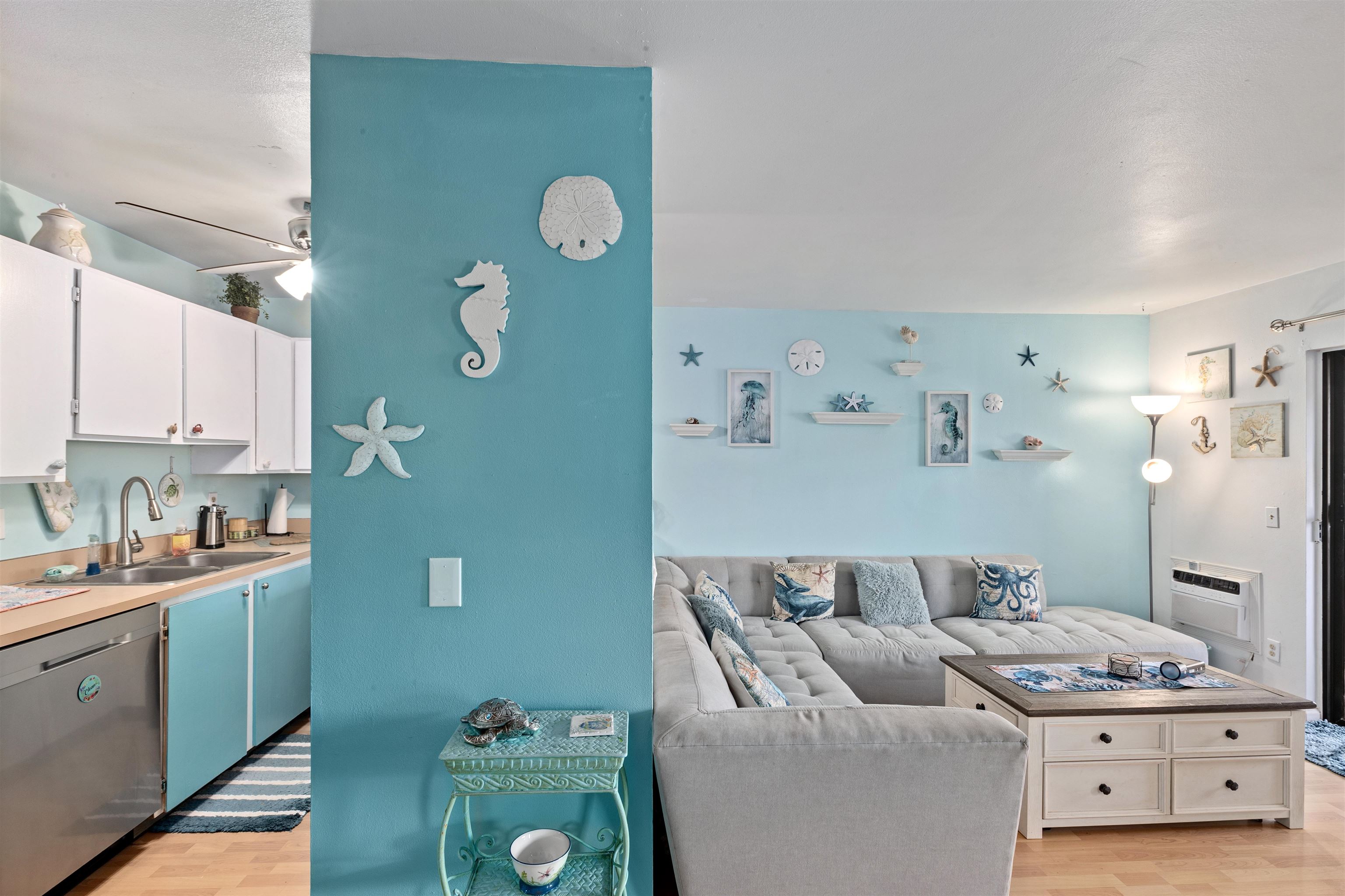 3740 Lower Honoapiilani Road, Unit F306 Lahaina, HI 96761 - Photo 7 of 30 a living room with furniture and a window