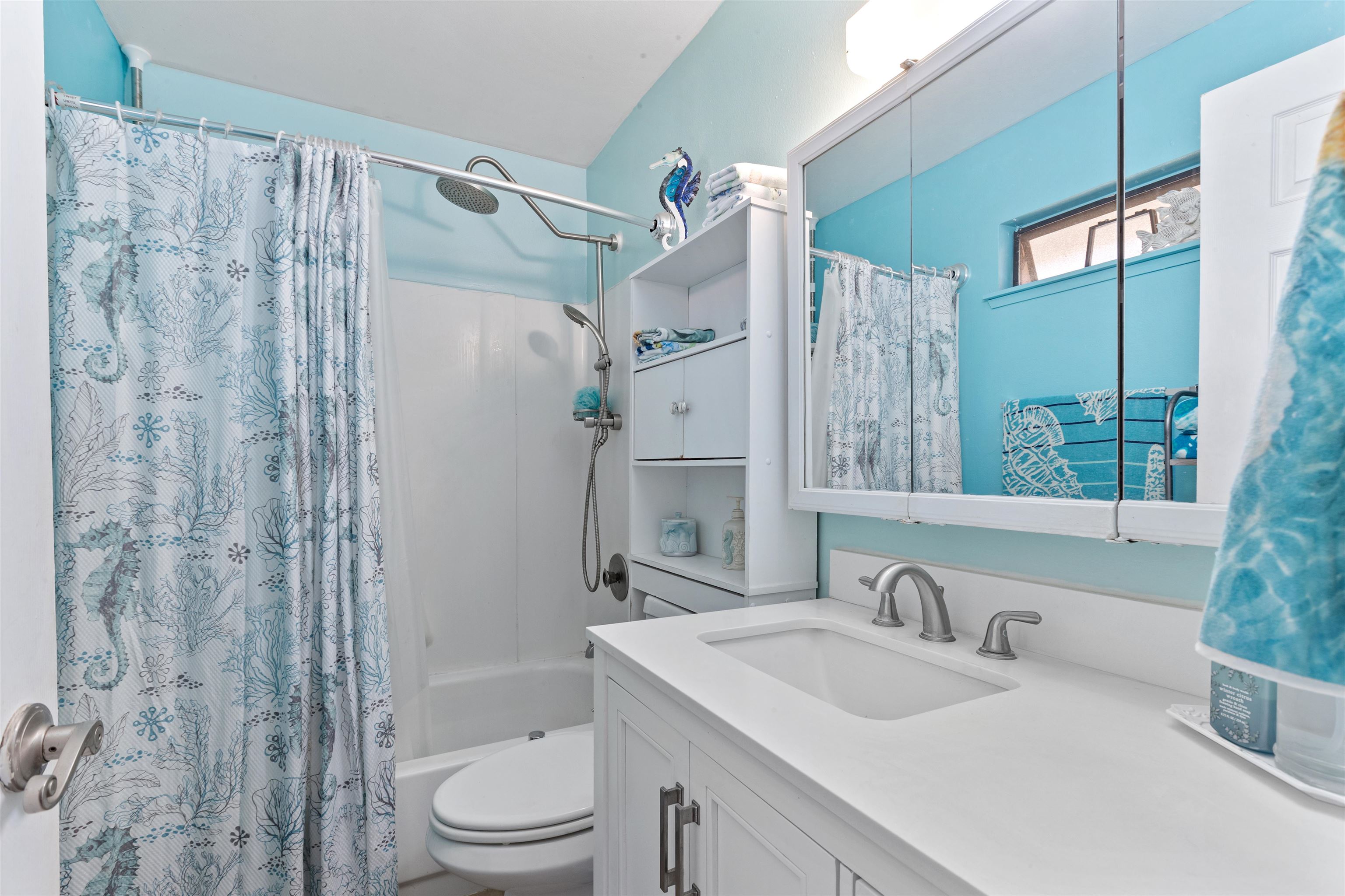 3740 Lower Honoapiilani Road, Unit F306 Lahaina, HI 96761 - Photo 8 of 30 a bathroom with a granite countertop sink a toilet and shower