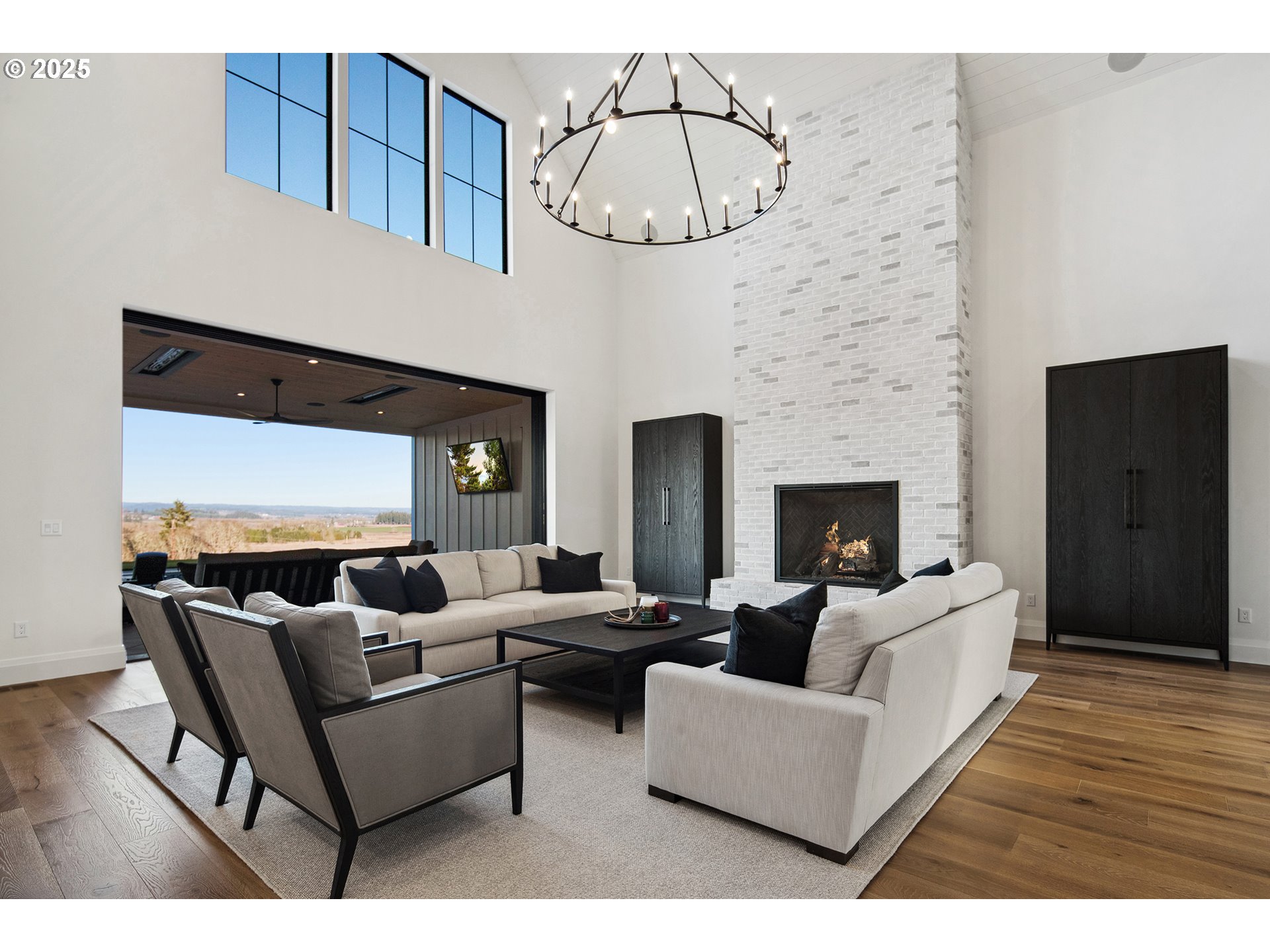 48493 Northwest Hillside Road Forest Grove, OR 97116 - Photo 20 of 48 a living room with furniture a fireplace and a flat screen tv