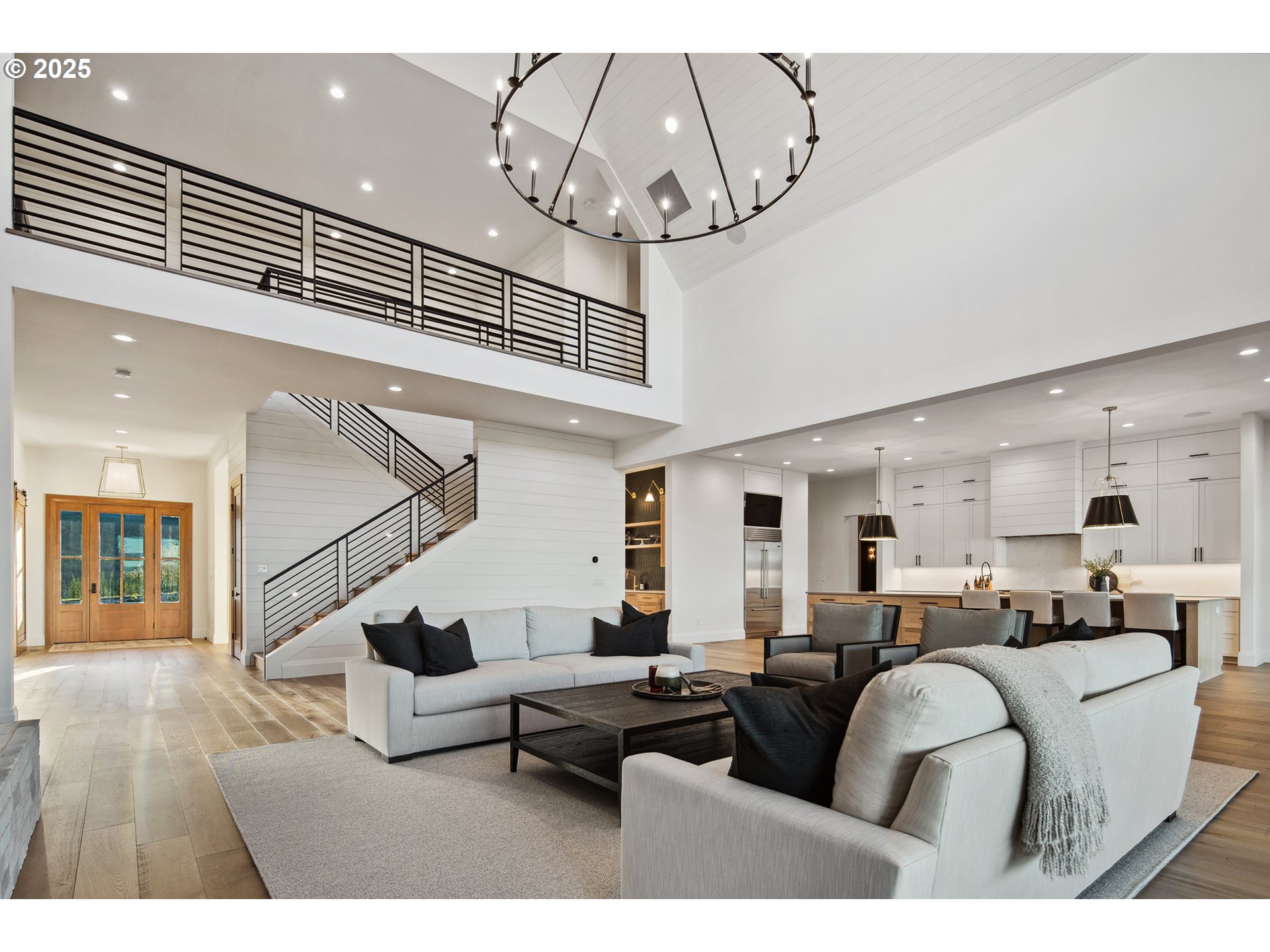 48493 Northwest Hillside Road Forest Grove, OR 97116 - Photo 22 of 48 a living room with furniture and a chandelier
