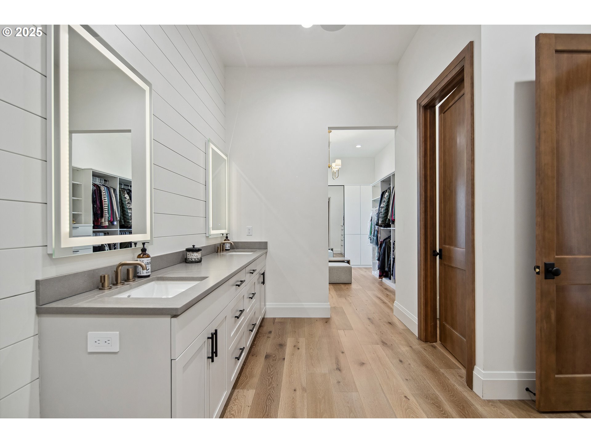48493 Northwest Hillside Road Forest Grove, OR 97116 - Photo 25 of 48 a bathroom with a double vanity sink a mirror and a shower