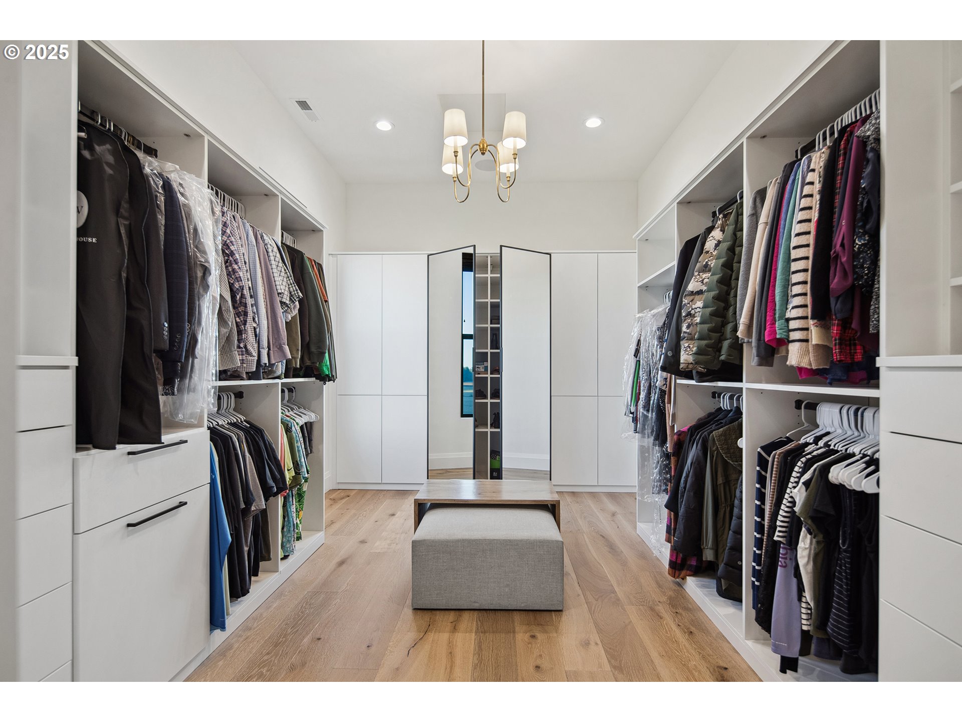 48493 Northwest Hillside Road Forest Grove, OR 97116 - Photo 26 of 48 a view of walk in closet with clothes and shoes