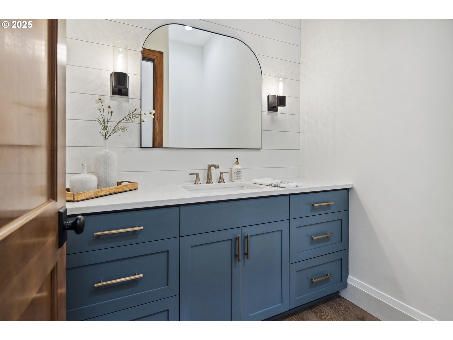48493 Northwest Hillside Road Forest Grove, OR 97116 - Photo 30 of 48 a bathroom with a sink and a mirror