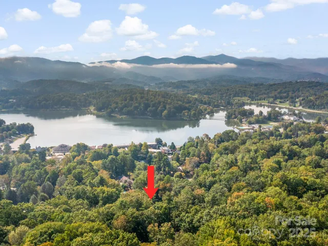 a view of a lake with mountains in the background