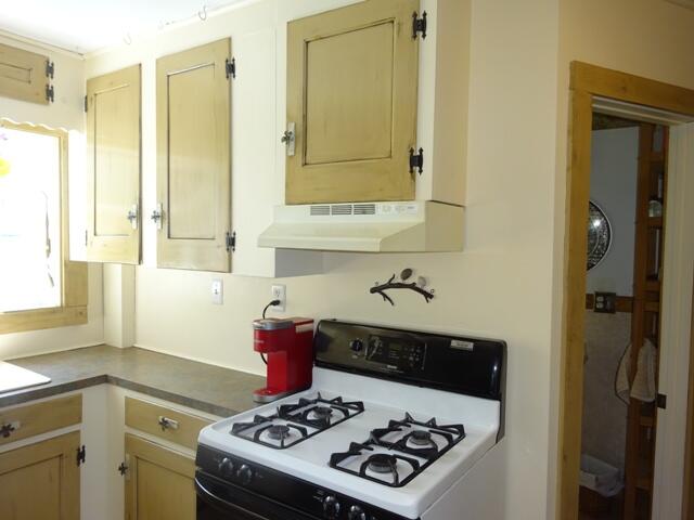 13 Old Salt Works Road Buzzards Bay, MA 02532 - Photo 12 of 49 a kitchen with a stove and a sink