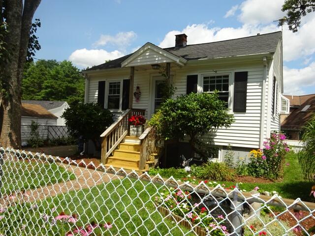 13 Old Salt Works Road Buzzards Bay, MA 02532 - Photo 2 of 49 a front view of a house with a yard