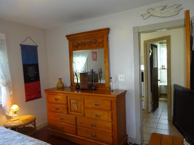 13 Old Salt Works Road Buzzards Bay, MA 02532 - Photo 22 of 49 a bathroom with a sink vanity and mirror