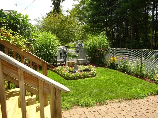 13 Old Salt Works Road Buzzards Bay, MA 02532 - Photo 3 of 49 a view of a backyard with garden