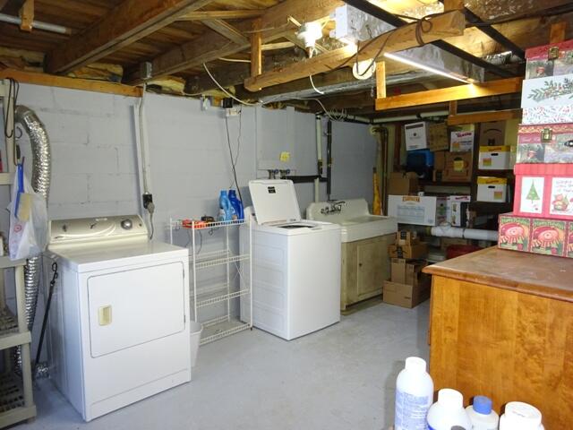 13 Old Salt Works Road Buzzards Bay, MA 02532 - Photo 33 of 49 a utility room with dryer and washer