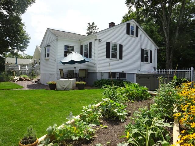 13 Old Salt Works Road Buzzards Bay, MA 02532 - Photo 34 of 49 a front view of a house with a garden