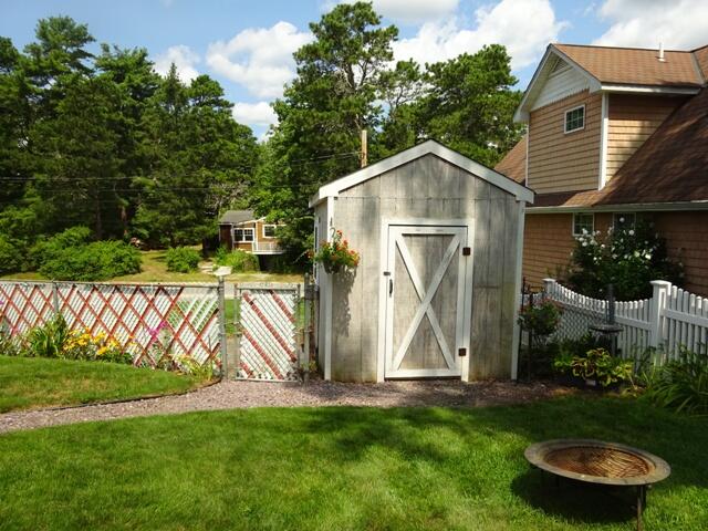 13 Old Salt Works Road Buzzards Bay, MA 02532 - Photo 38 of 49 a view of an house with backyard space and garden