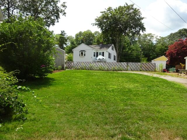 13 Old Salt Works Road Buzzards Bay, MA 02532 - Photo 40 of 49 a view of a house with a big yard and large trees