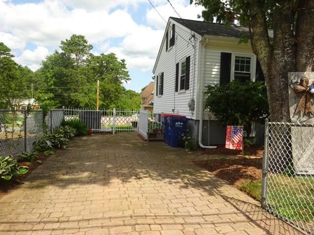 13 Old Salt Works Road Buzzards Bay, MA 02532 - Photo 6 of 49 a view of a car park in front of a house
