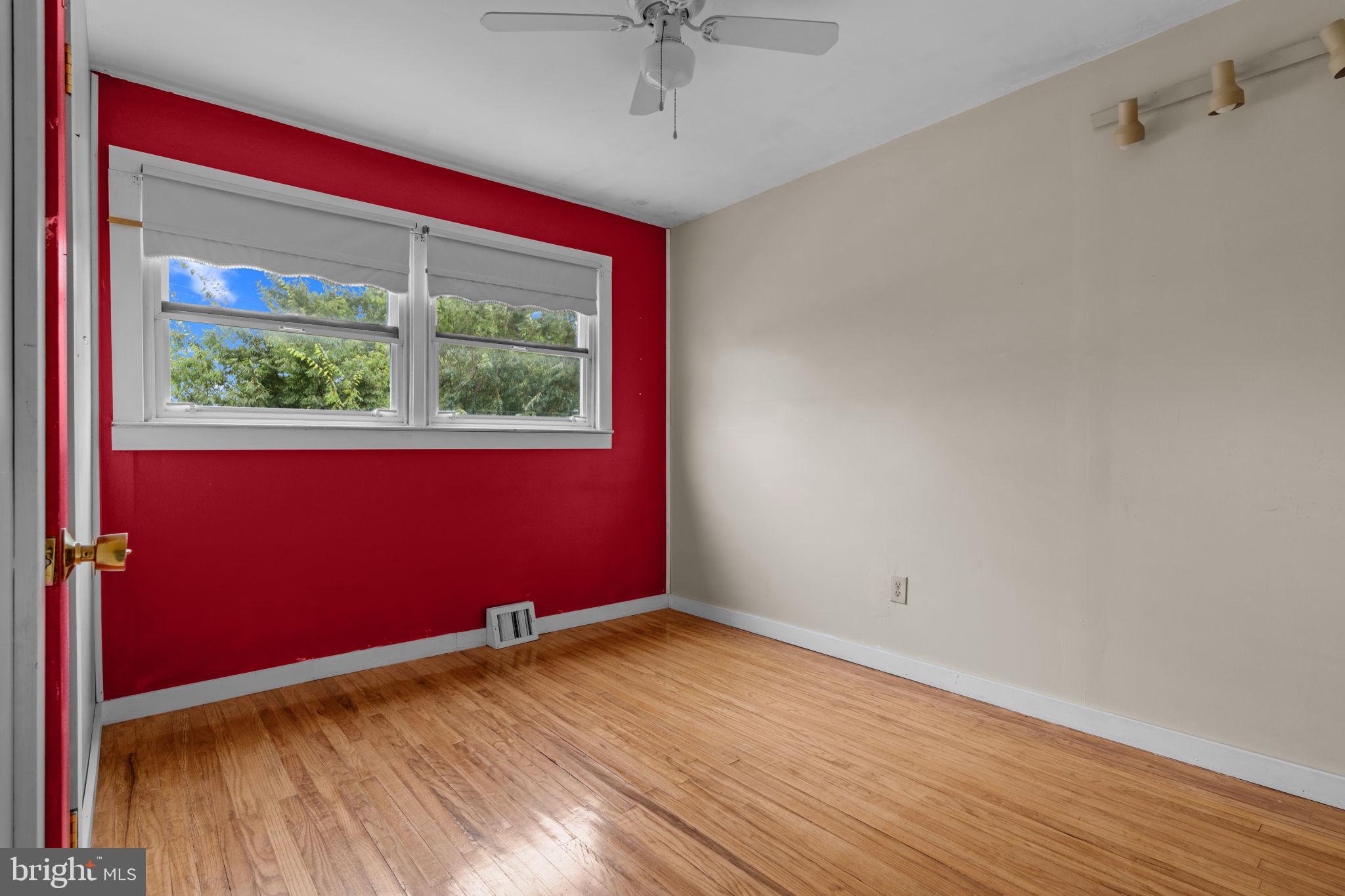 3817 Dorchester Road Philadelphia, PA 19154 - Photo 23 of 32 a view of empty room with wooden floor and fan