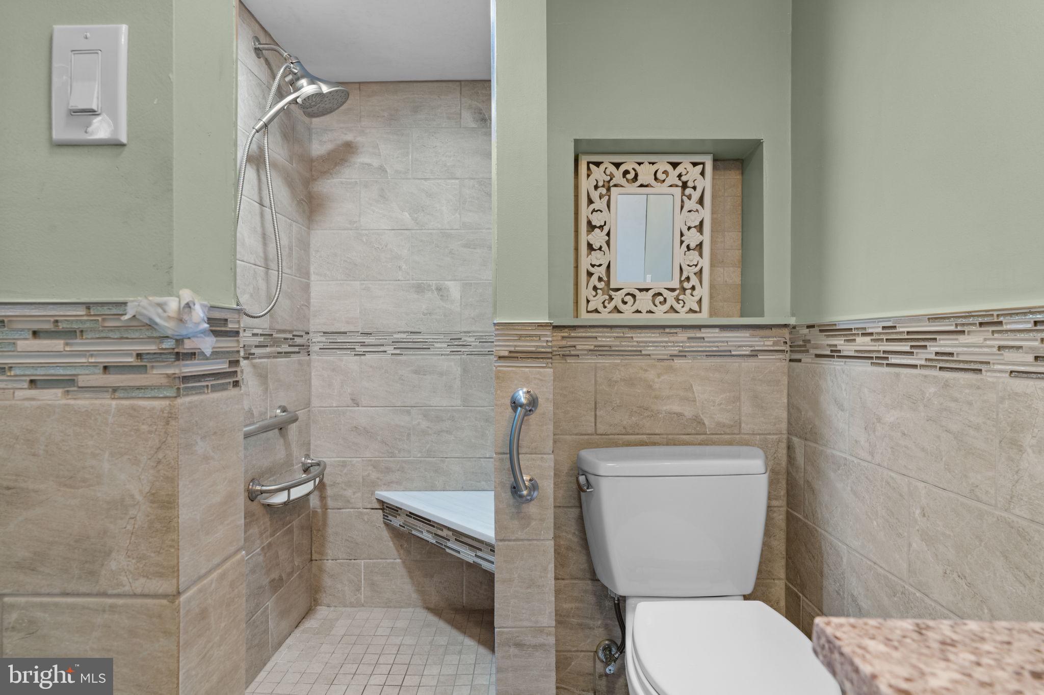 3817 Dorchester Road Philadelphia, PA 19154 - Photo 8 of 32 a bathroom with a toilet and a shower
