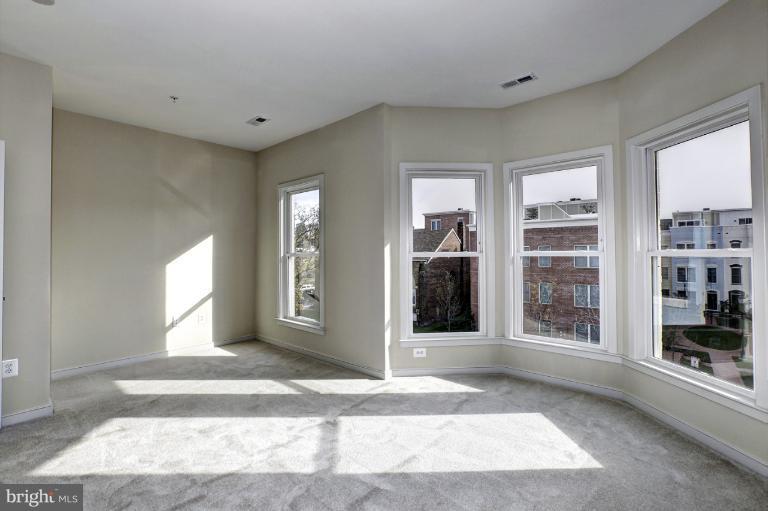 915 4th Street Southeast Washington, DC 20003 - Photo 17 of 24 a view of a living room with a large window