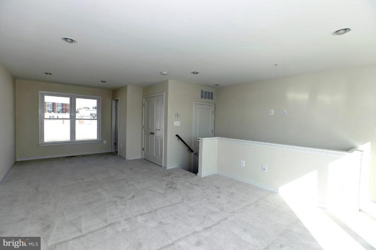 915 4th Street Southeast Washington, DC 20003 - Photo 19 of 24 a view of an empty room with a window