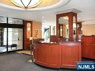 2000 Linwood Avenue, Unit 10M Fort Lee, NJ 07024 - Photo 16 of 28 a view of a room with gym equipment