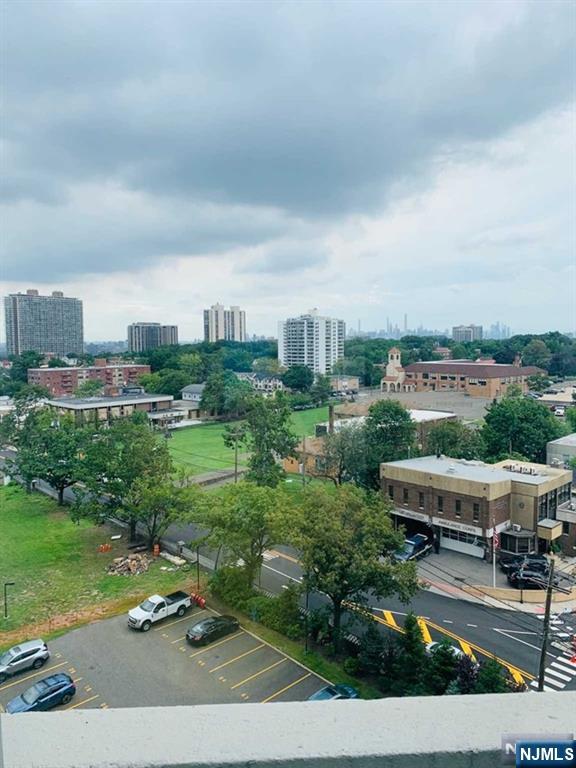 2000 Linwood Avenue, Unit 10M Fort Lee, NJ 07024 - Photo 2 of 28 a view of a terrace with yard and mountain view in back