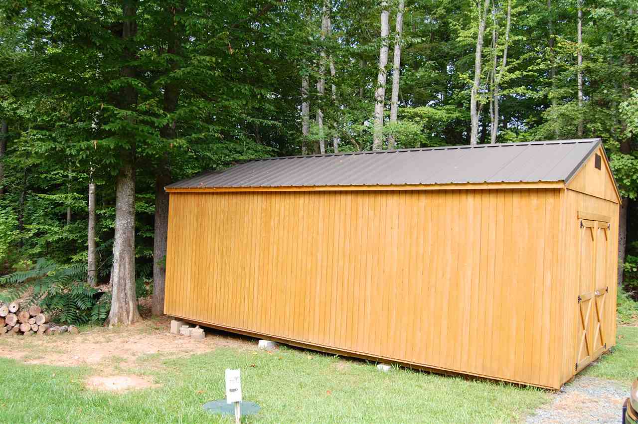 6227 3 Notch Road Louisa, VA 23093 - Photo 4 of 44 a view of a yard with an outdoor space