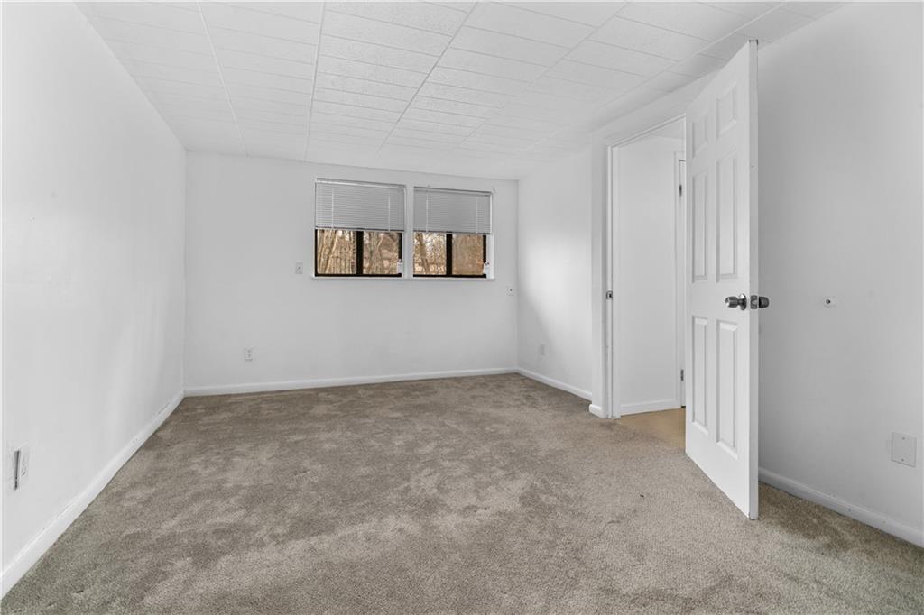 321 Ridge Point Circle, Unit B12 Bridgeville, PA 15017 - Photo 13 of 26 a view of an empty room