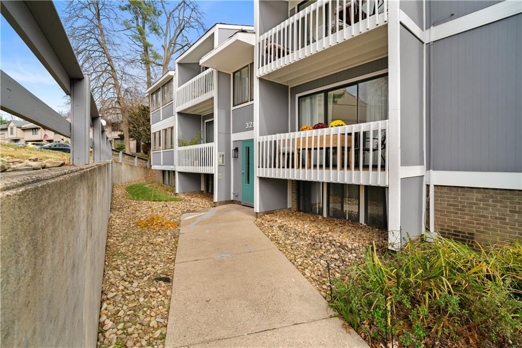 321 Ridge Point Circle, Unit B12 Bridgeville, PA 15017 - Photo 2 of 26 a view of a house with a balcony