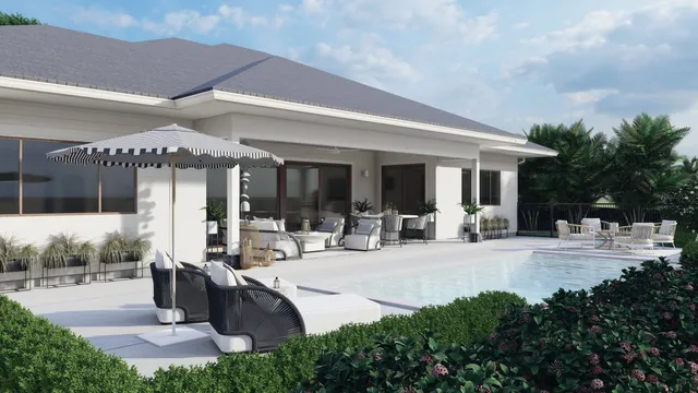 a view of a patio with dining table and chairs under an umbrella