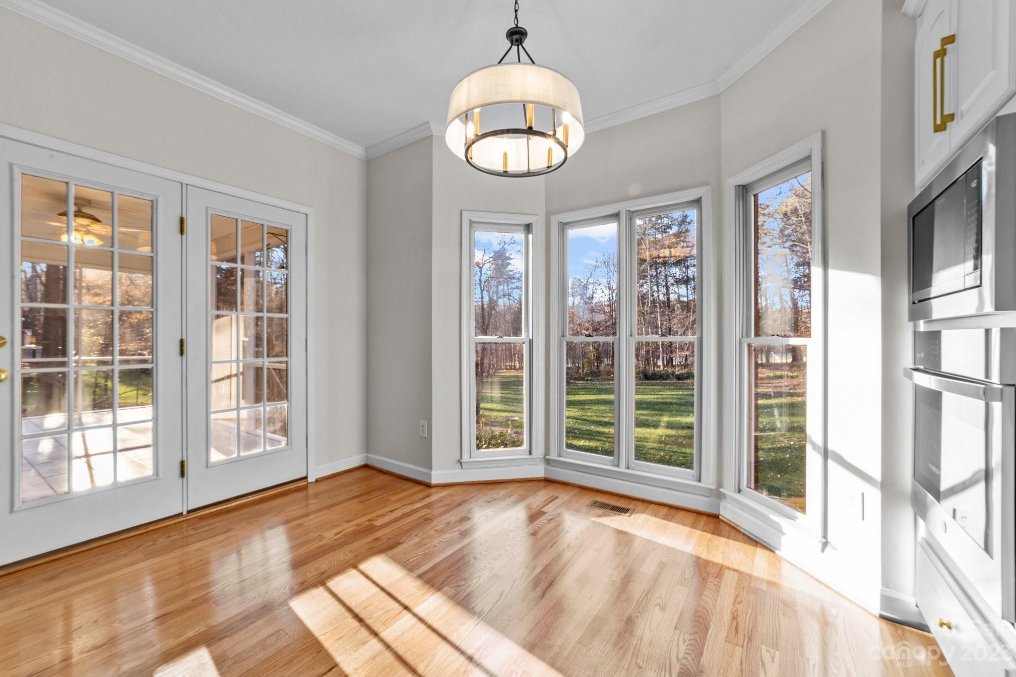 5476 Deer Run Court Davidson, NC 28036 - Photo 28 of 48 a view of an entryway with wooden floor