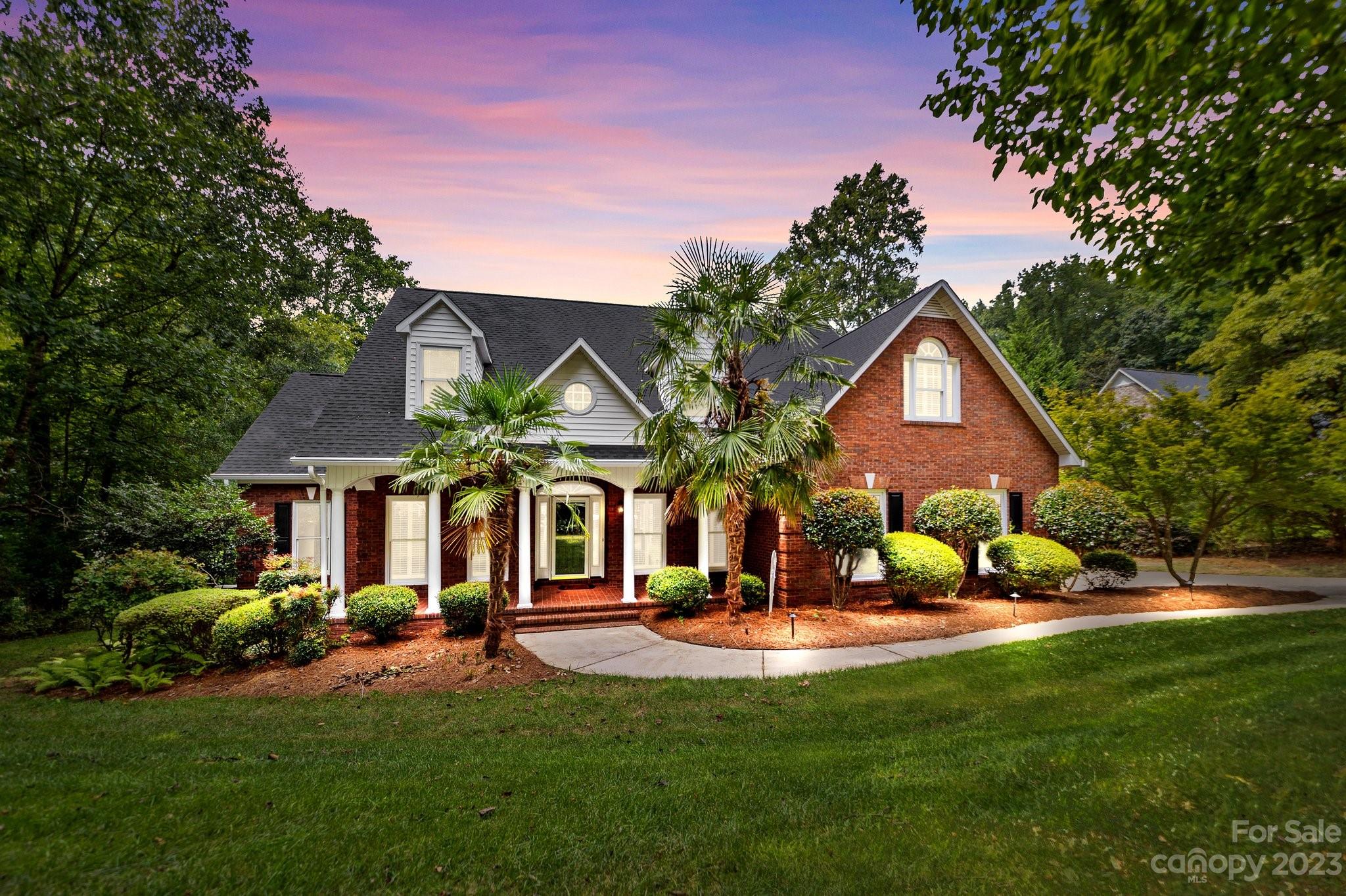 5476 Deer Run Court Davidson, NC 28036 - Photo 3 of 48 a view of a house with a swimming pool