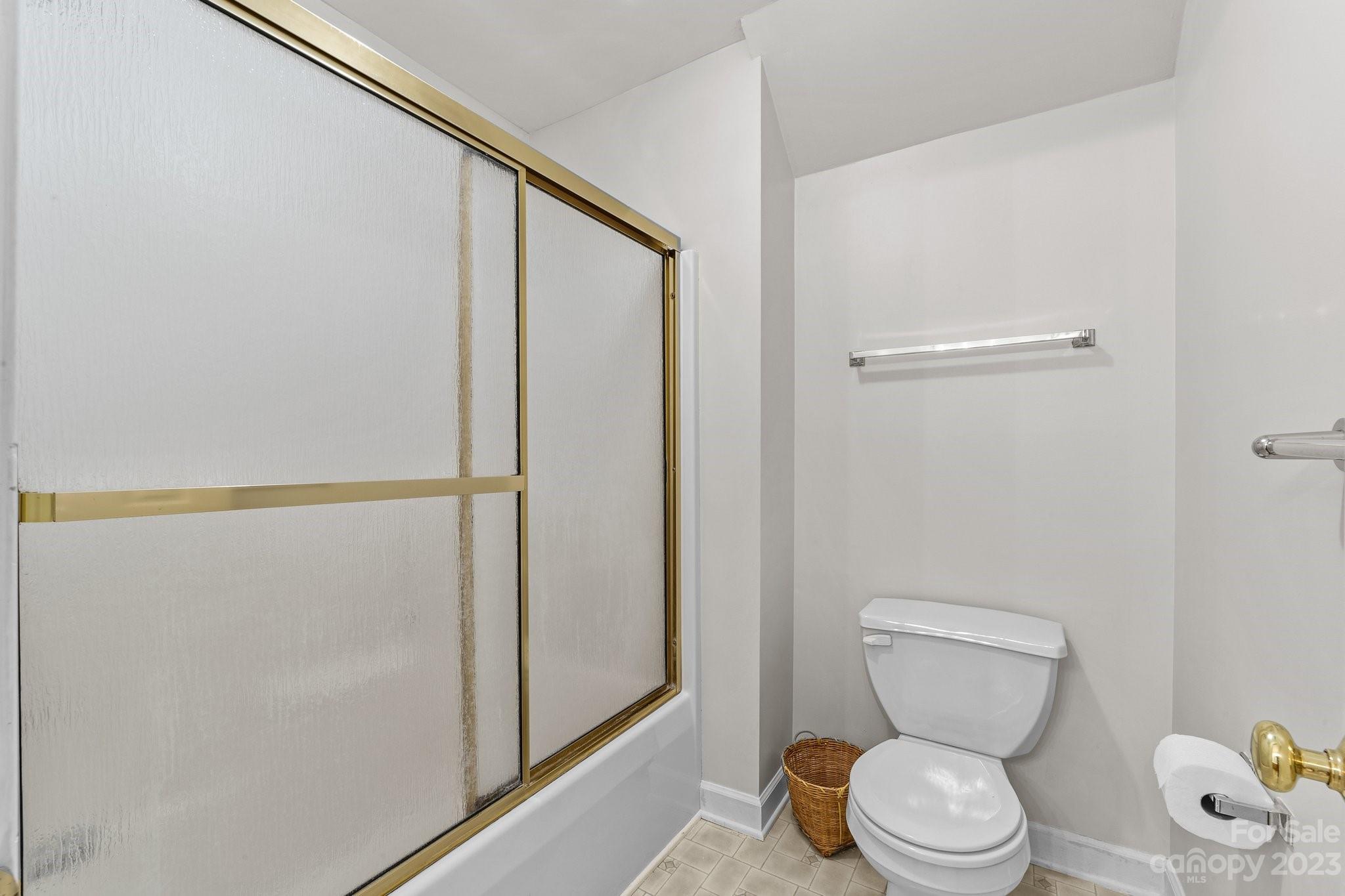 5476 Deer Run Court Davidson, NC 28036 - Photo 41 of 48 a white toilet sitting next to a shower