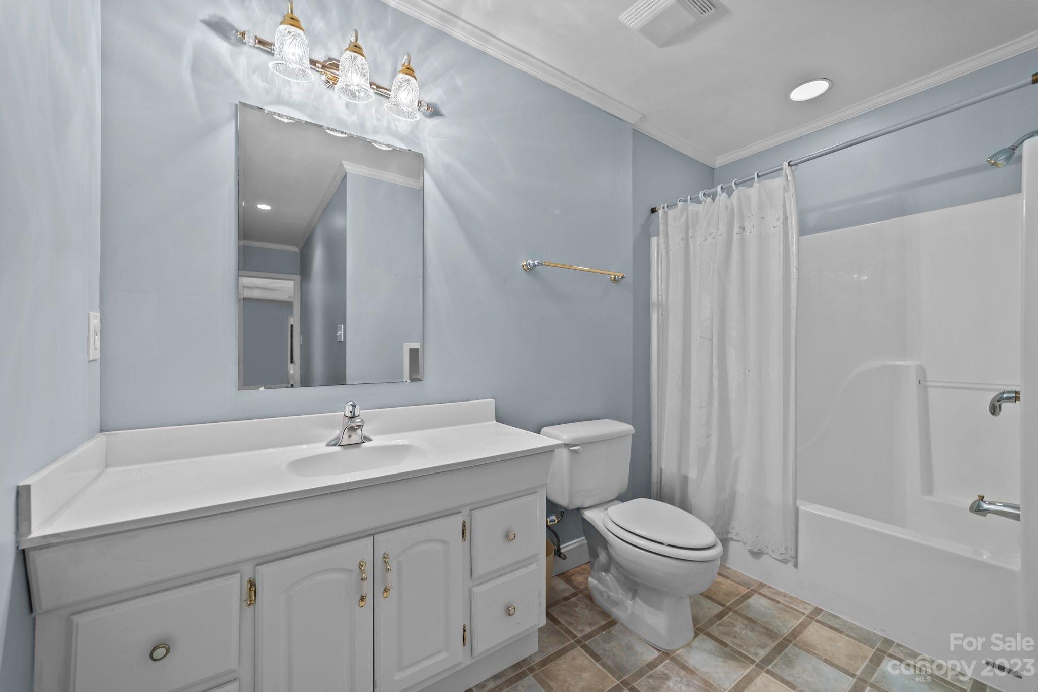 5476 Deer Run Court Davidson, NC 28036 - Photo 47 of 48 a bathroom with a sink a toilet and shower