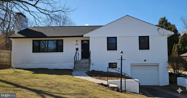 a house view with a backyard space