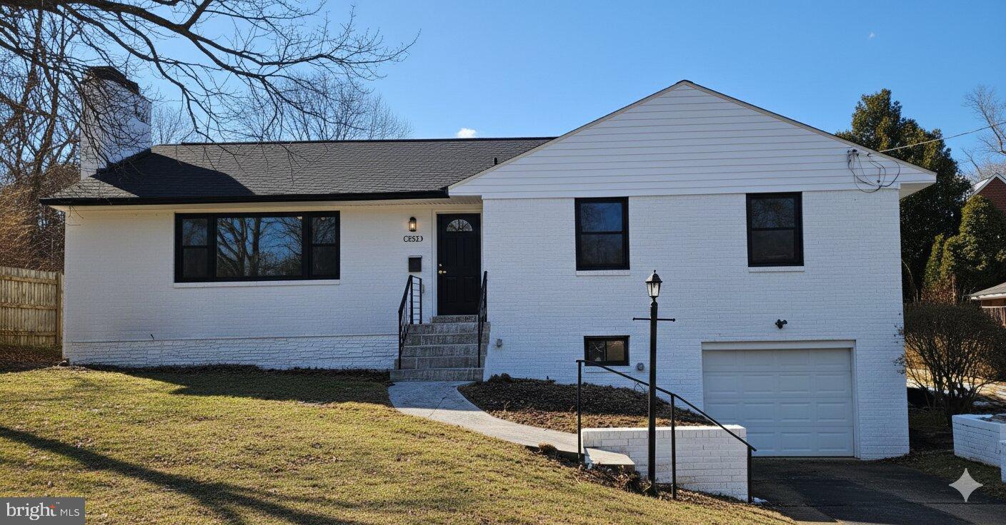 a house view with a backyard space
