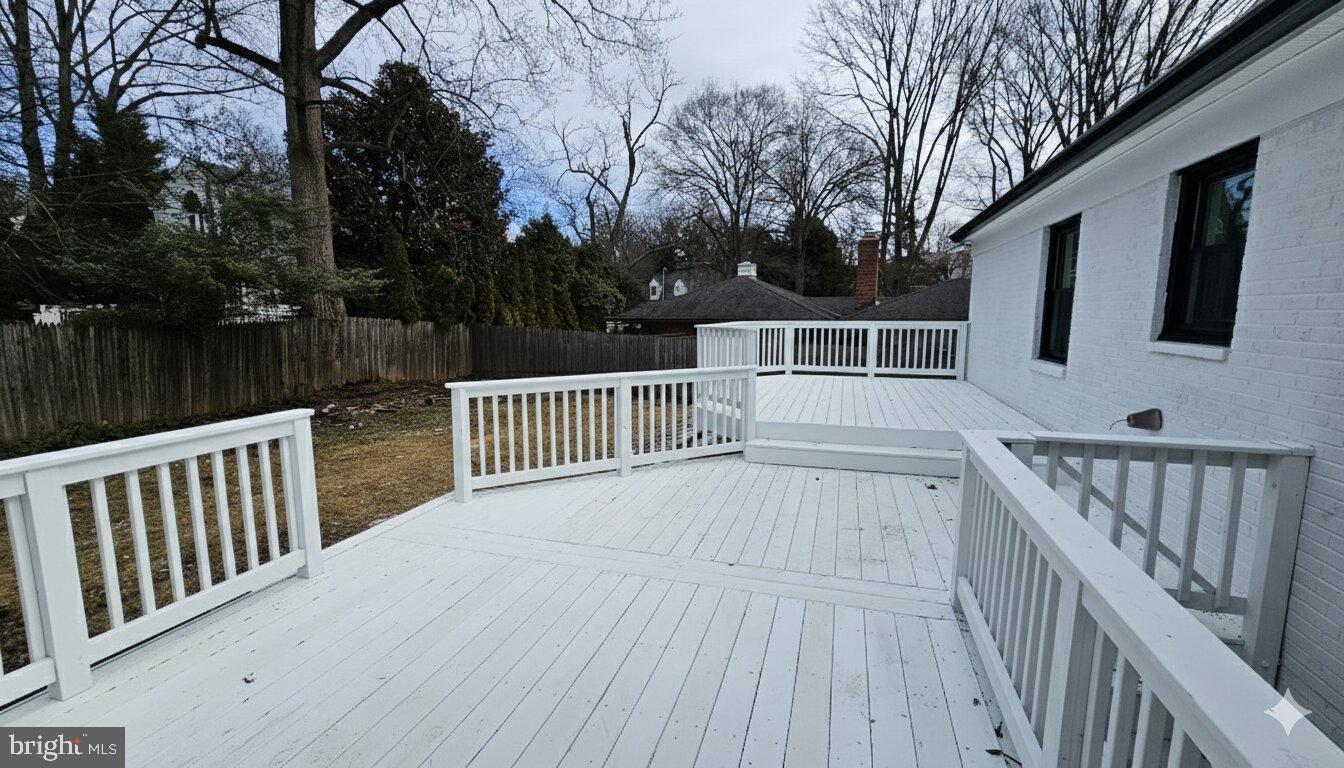 1305 Woodside Parkway Silver Spring, MD 20910 - Photo 11 of 41 a view of backyard with deck and wooden floor
