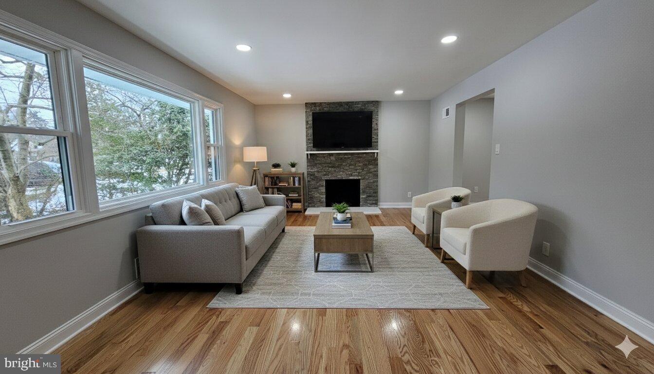 1305 Woodside Parkway Silver Spring, MD 20910 - Photo 2 of 41 a living room with furniture and a fireplace