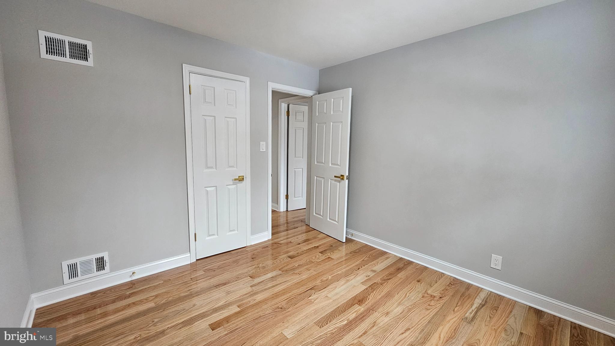 1305 Woodside Parkway Silver Spring, MD 20910 - Photo 23 of 41 a view of empty room with wooden floor