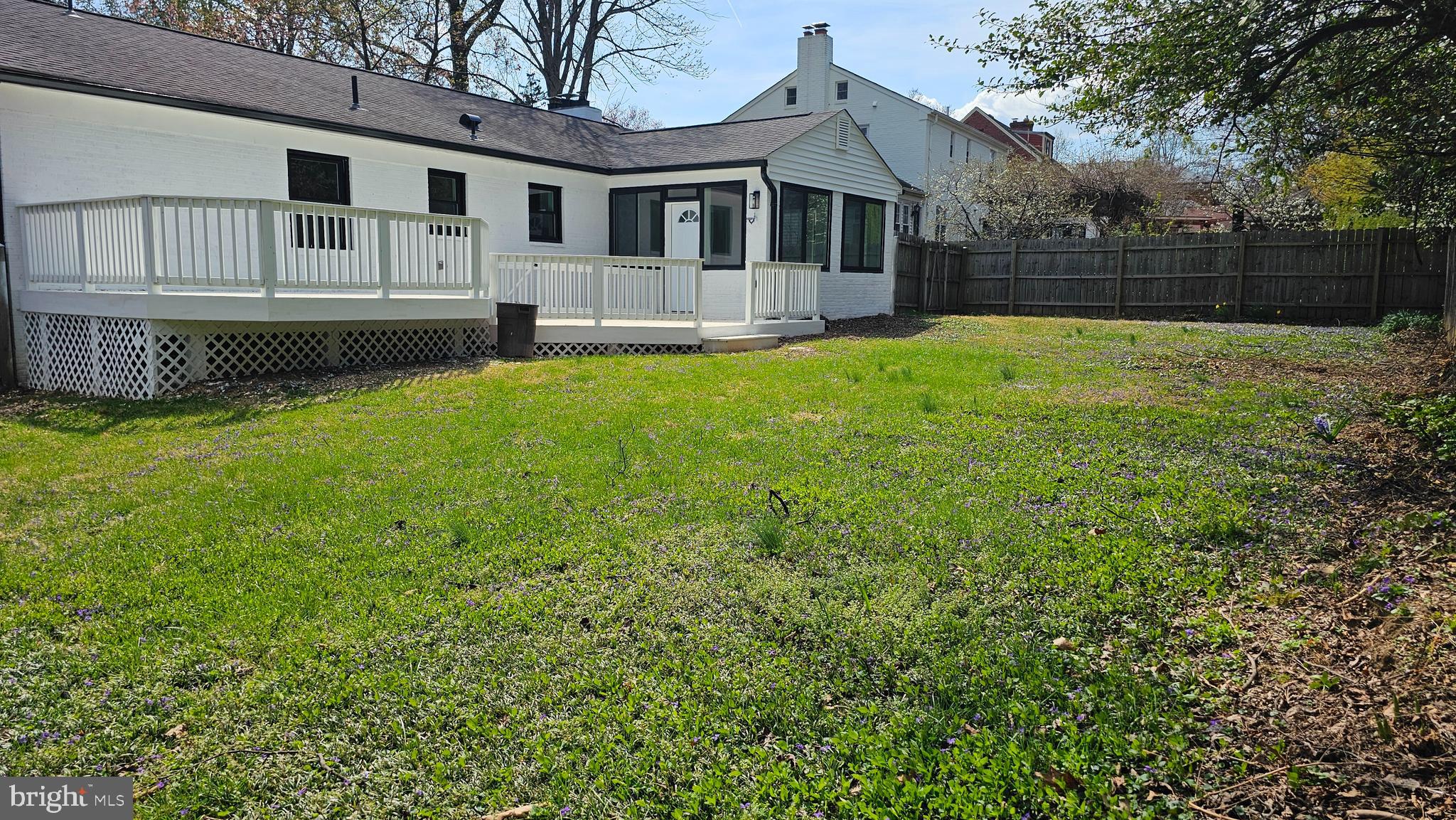 1305 Woodside Parkway Silver Spring, MD 20910 - Photo 40 of 42 a front view of house with yard and trees in the background