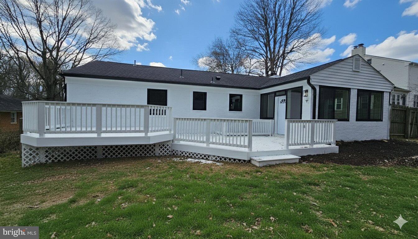 1305 Woodside Parkway Silver Spring, MD 20910 - Photo 42 of 42 a view of a house with a yard and a wooden deck