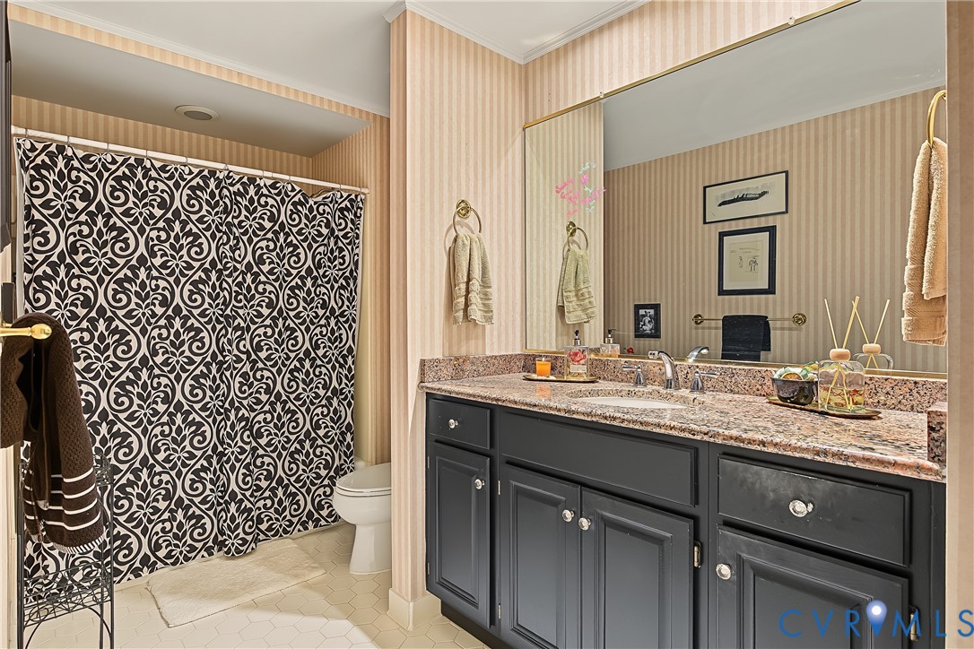 3131 Stony Point Road, Unit B Richmond, VA 23235 - Photo 42 of 65 Bathroom featuring a dual-sink vanity with a speck