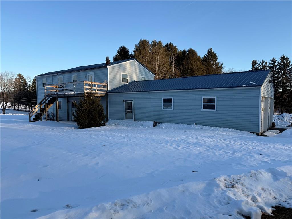 a view of a house with roof deck