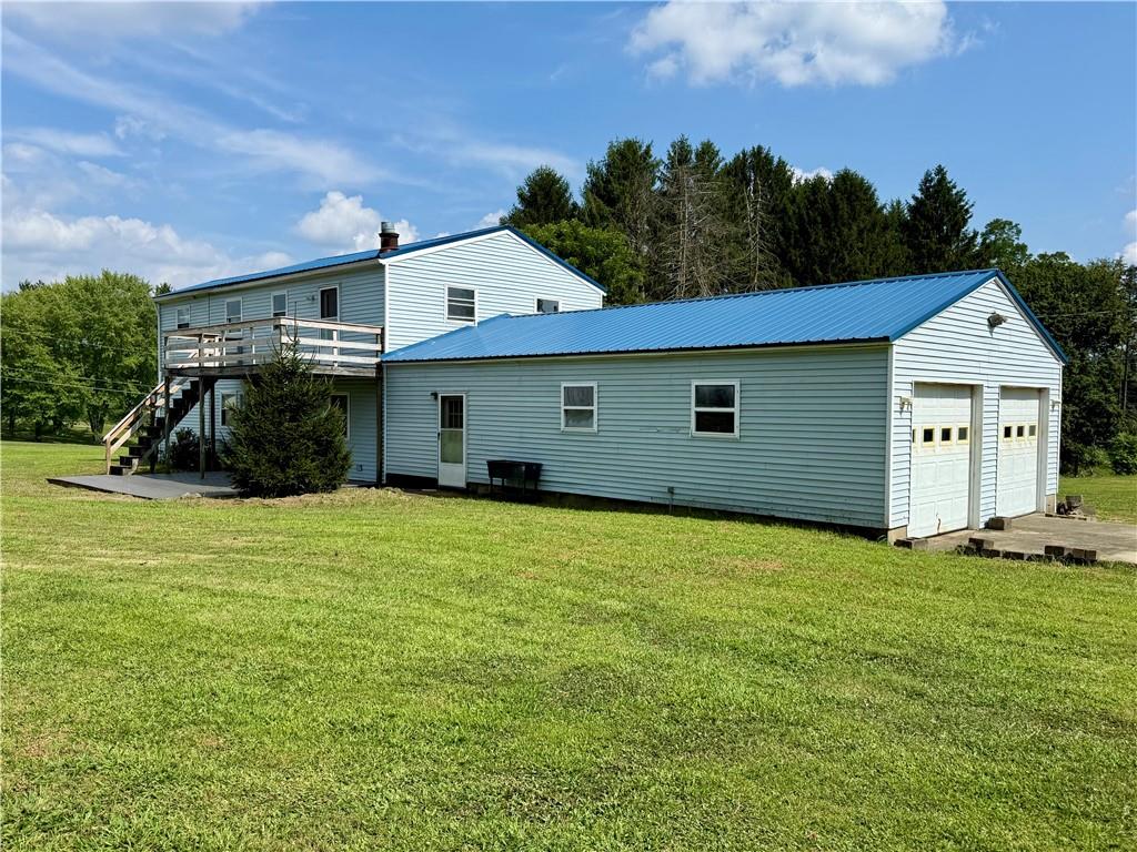 188 Reiber Road Renfrew, PA 16053 - Photo 24 of 38 a front view of a house with garden