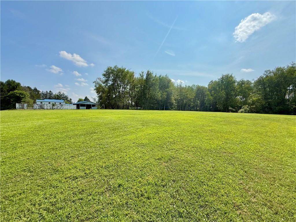 188 Reiber Road Renfrew, PA 16053 - Photo 32 of 38 a view of a lake with a yard