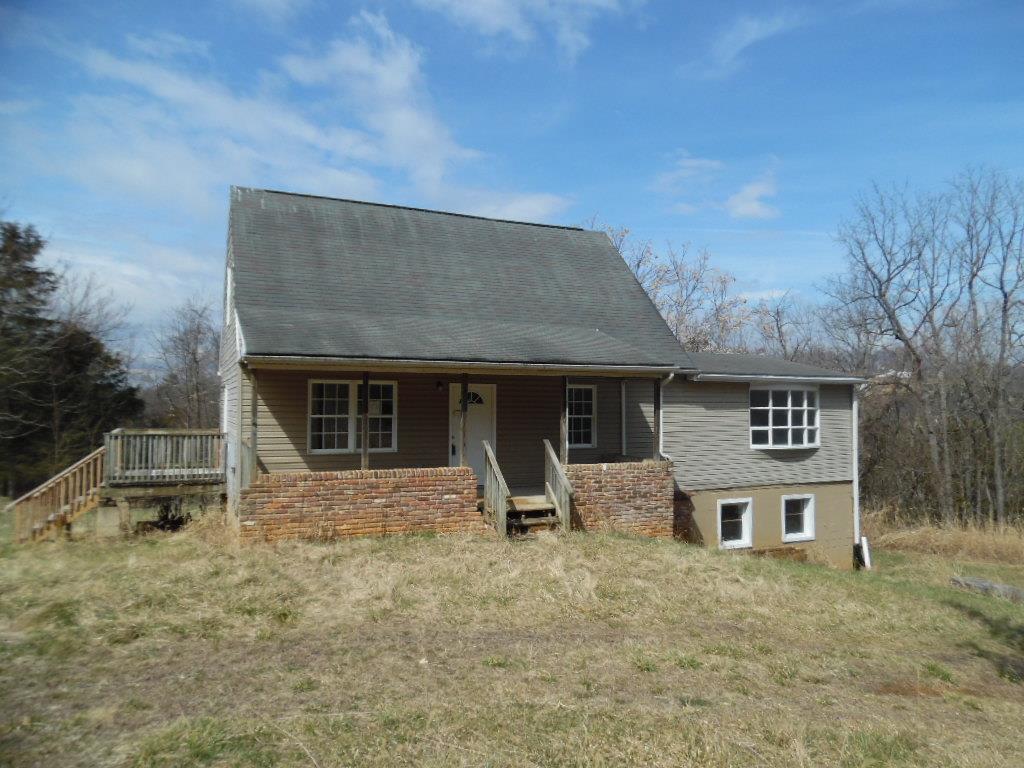 760 Lea Port Road Verona, VA 24482 - Photo 1 of 10 a front view of a house with parking space