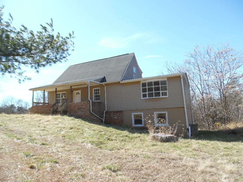 760 Lea Port Road Verona, VA 24482 - Photo 3 of 10 a front view of a house with a yard covered in snow