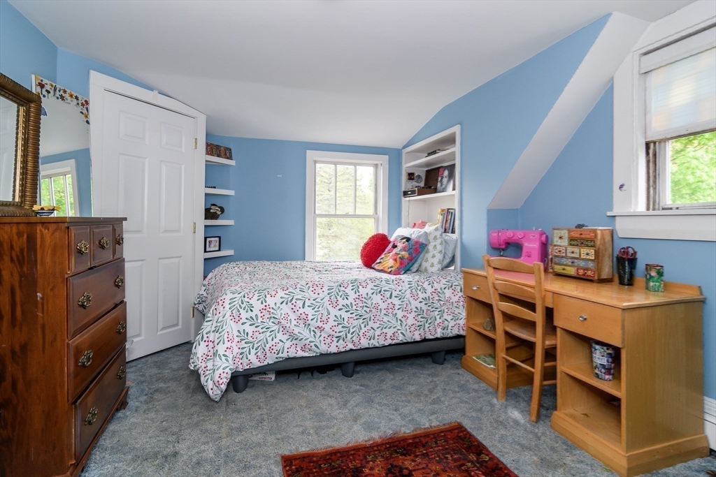 8 Charles Street Natick, MA 01760 - Photo 23 of 36 a bedroom with a bed dresser and a window